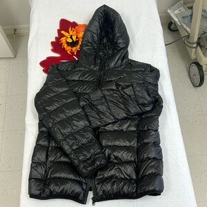 Sarin Mathew’s black coat size XL